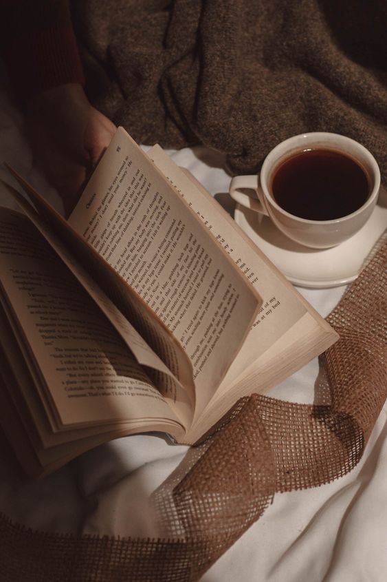 A coffee and open book