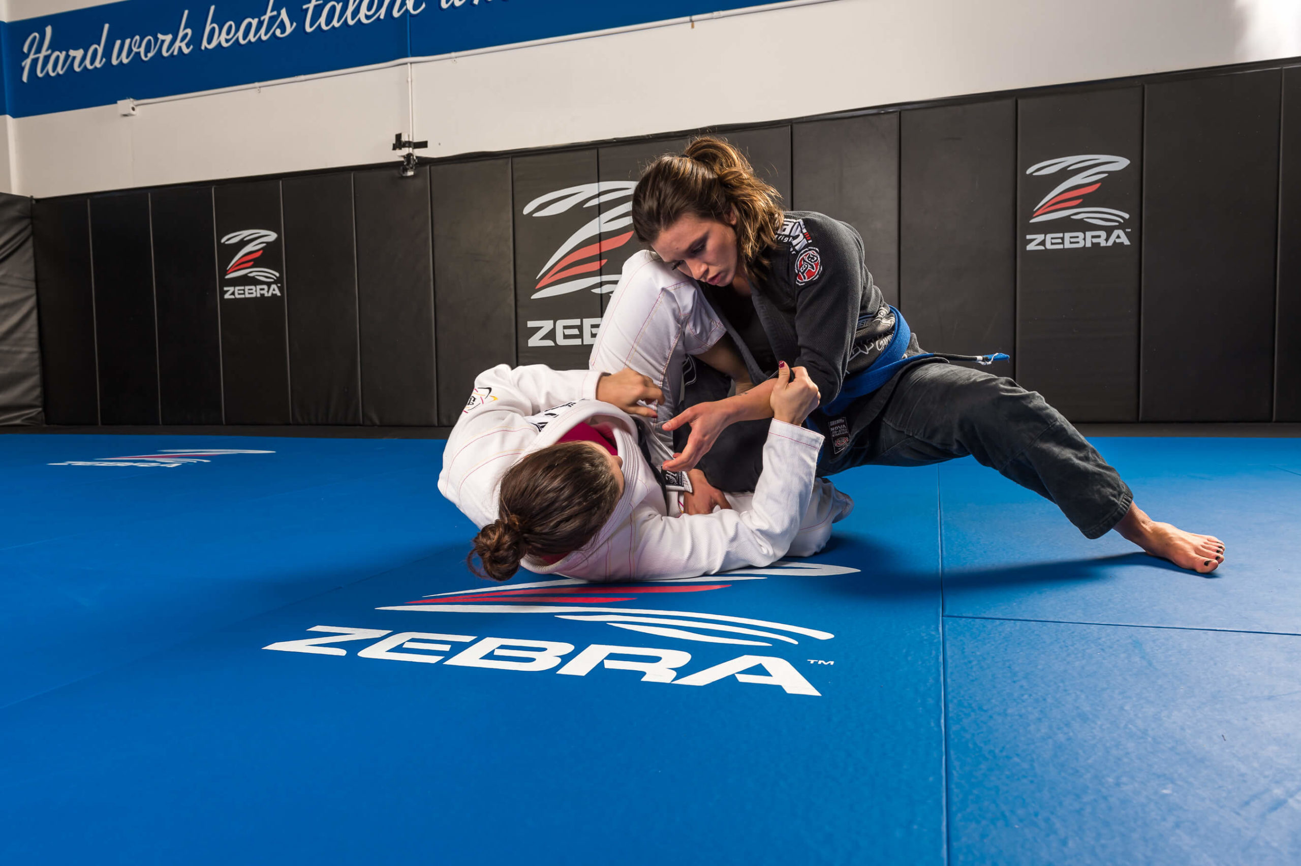 Women doing jiu jitsu