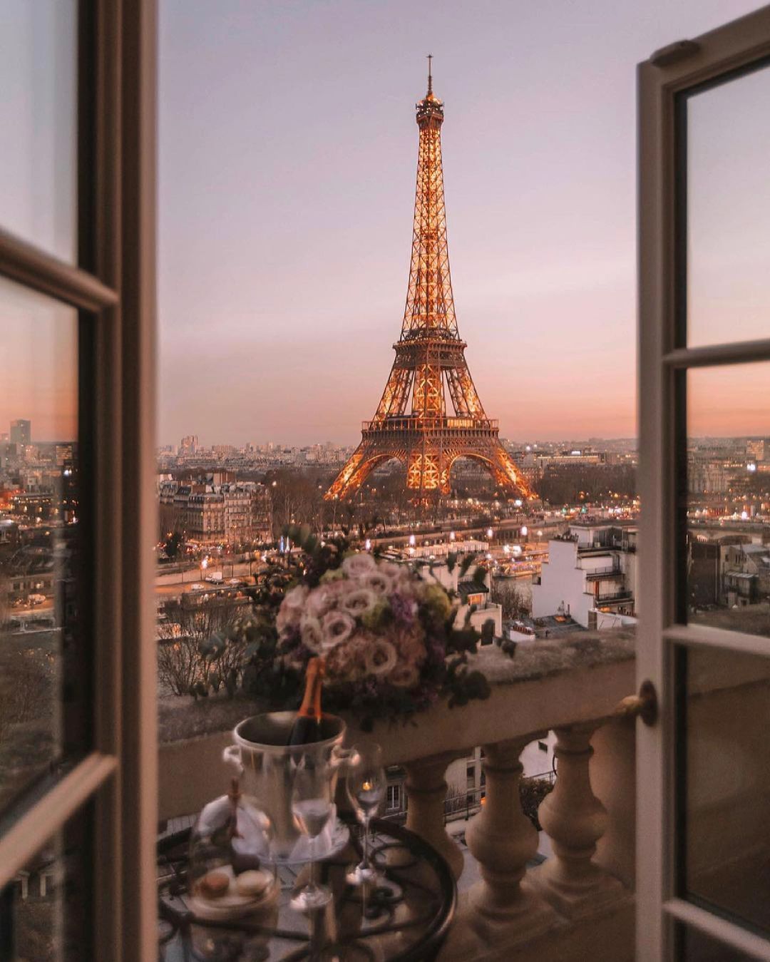 The Eiffel Tower though a window