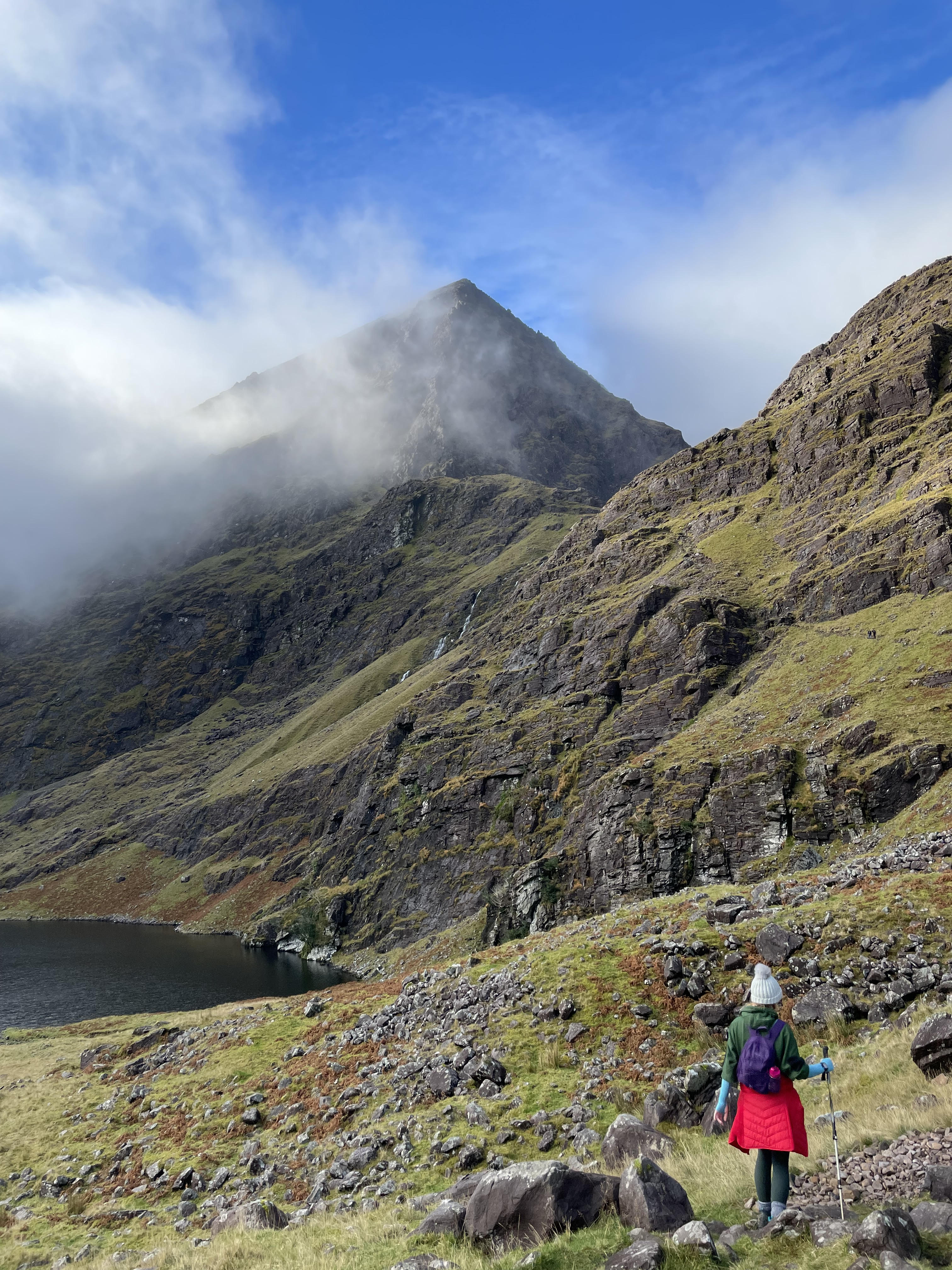 girl walking up mountain