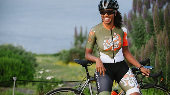 happy black female cyclist