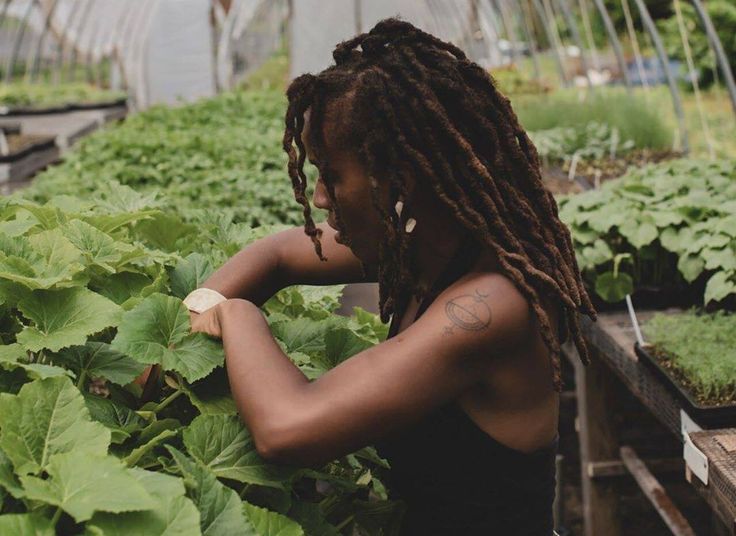 Woman in greenhouse
