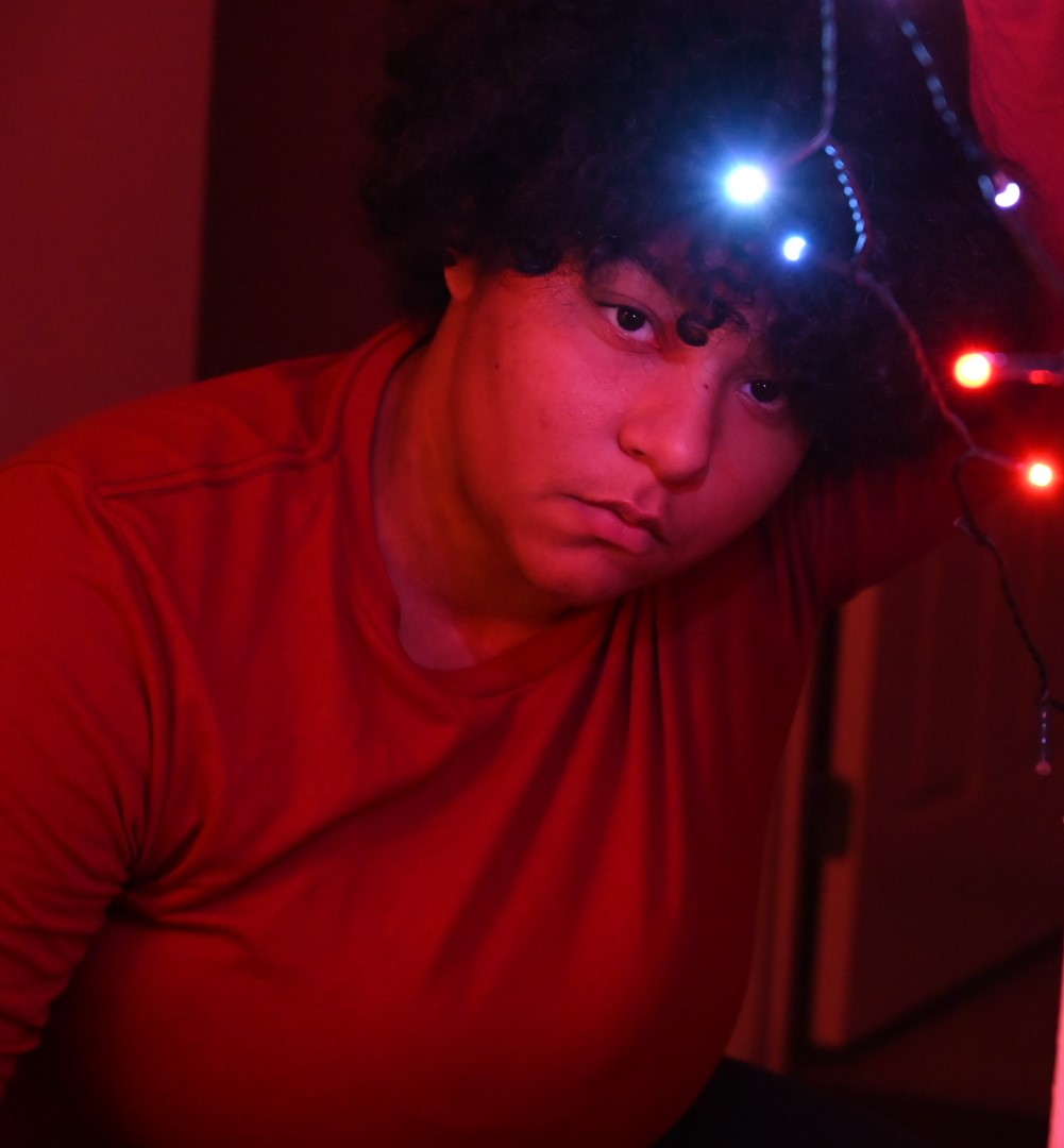 Girl bathed in red light