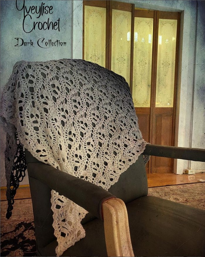 Chrocheted shawl with skull pattern throughout