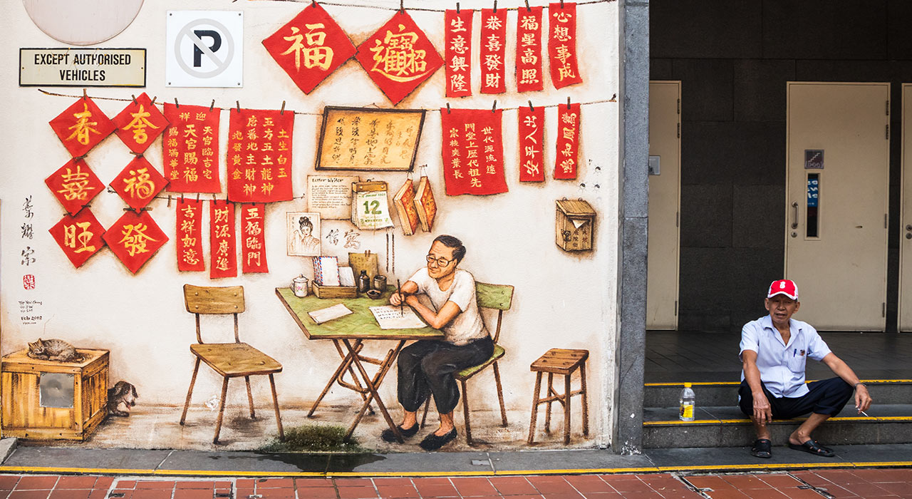 Chinese man sitting in a traditional café