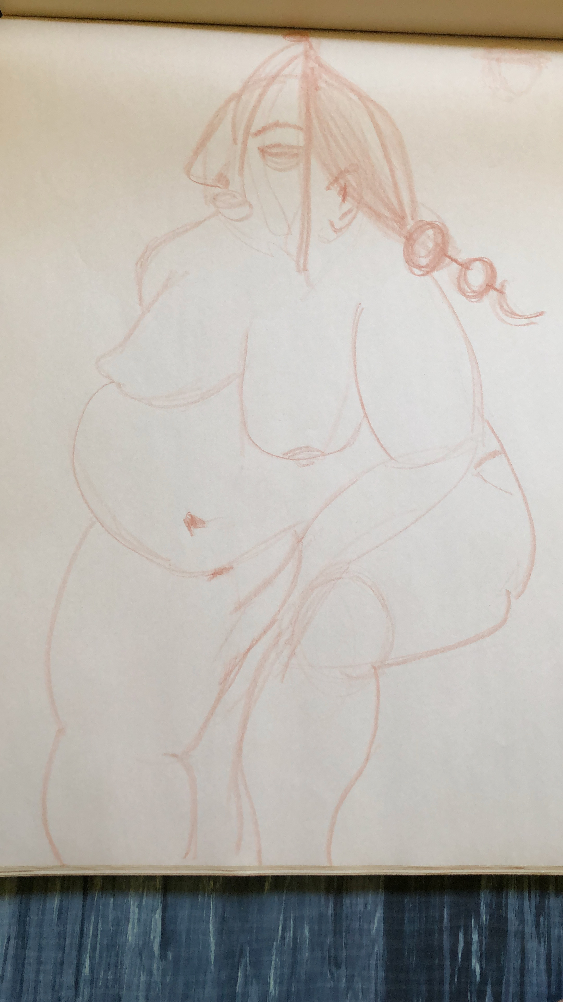 Quick sketch in brown charcoal of a voluptuous woman