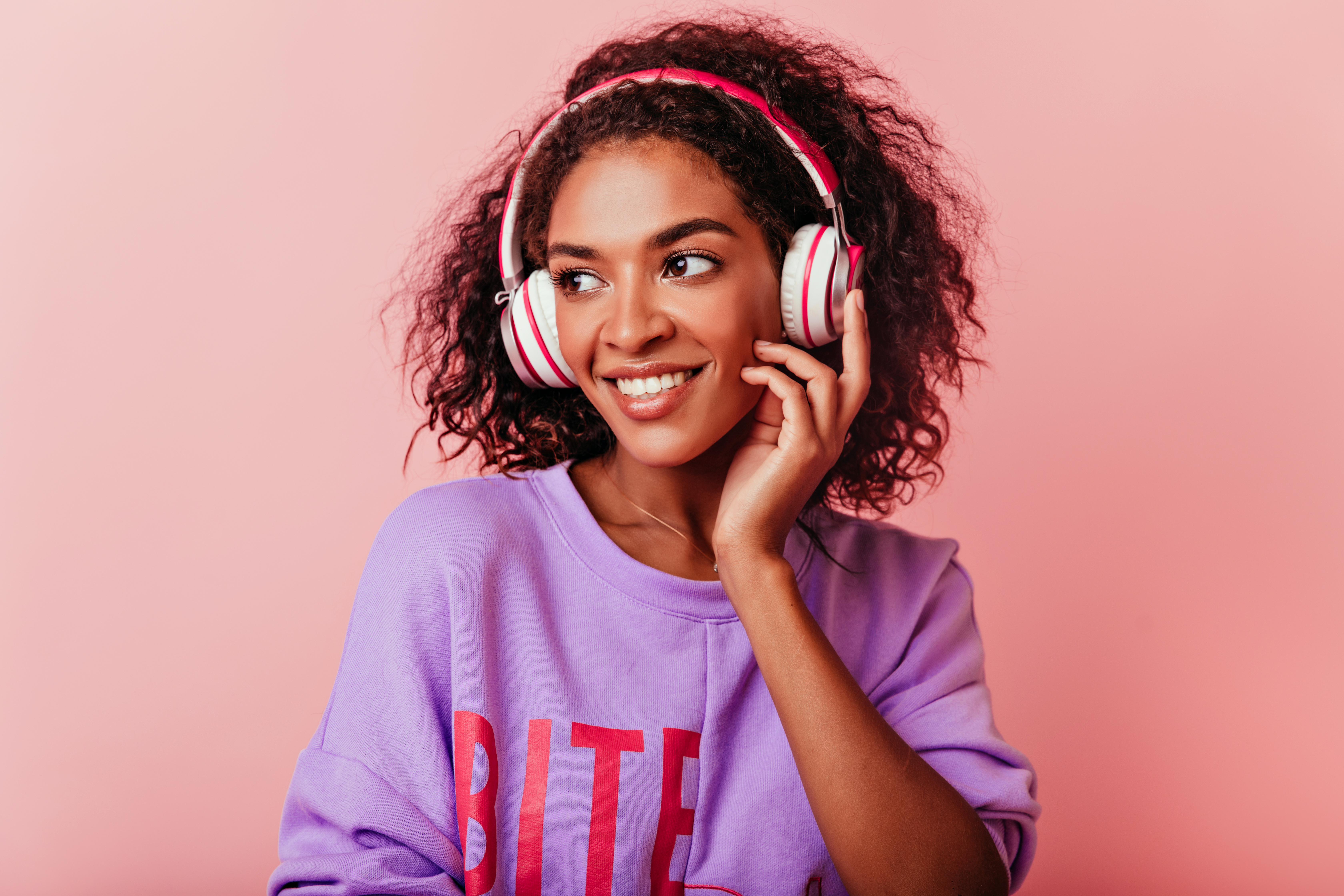 Black woman listening to music