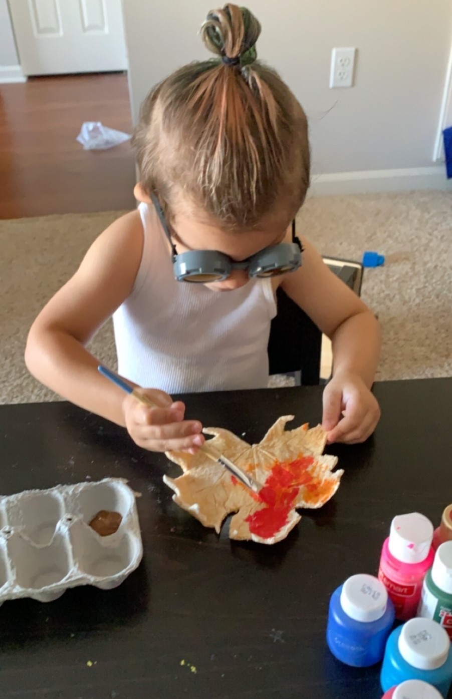 Kid painting ceramic