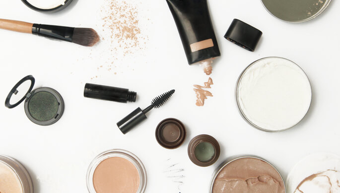 scattered makeup products