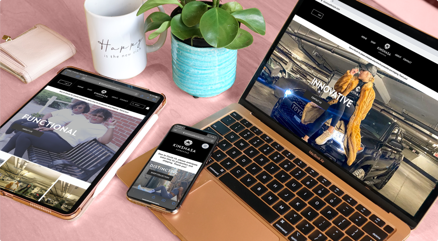 An Ipad Air 2020 in pink, An Iphone 11 Pro in gold, and a Macbook Air 2020 M1 Chip in Pink. A plant, a coffee, and a pink wallet on a table.