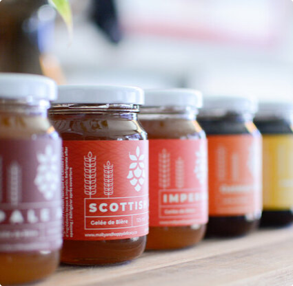 This is an image of Malty & Hoppy's Beer Jelly Collection in a lightly lit room.
