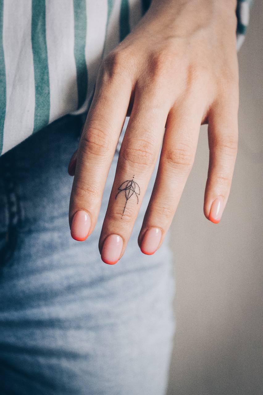 lotus on finger