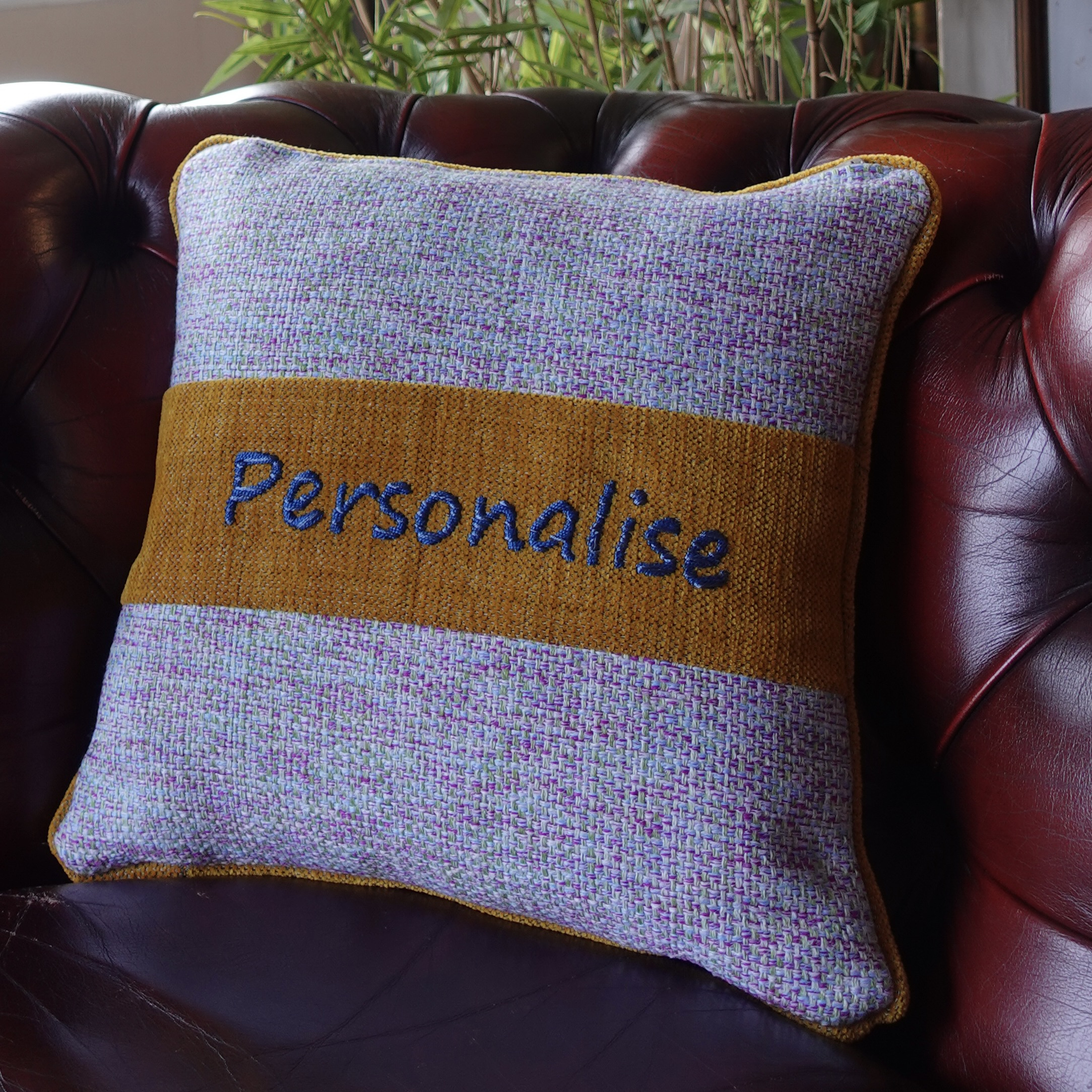 Personalised cushion with highlighting strip