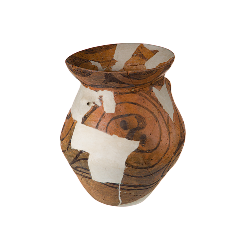 A pitcher with ying and yang symbols