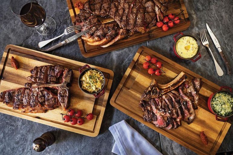 t-bone steak and side dish