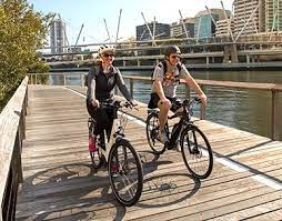 Cycling along Brisbane river