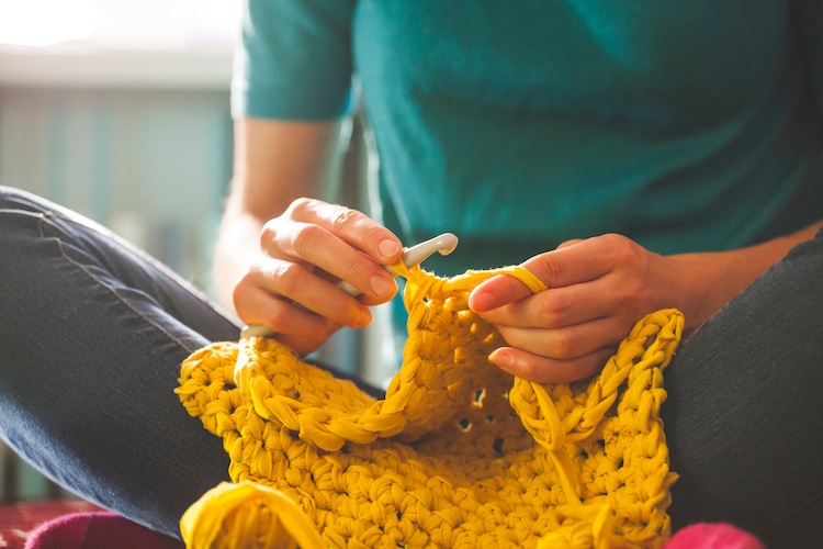 Woman crocheting