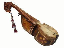 A rabab against a white background. The sides are decorated with beautiful patterns.