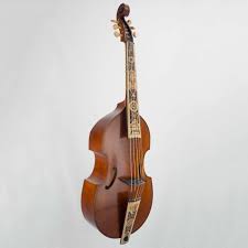 A picture of a viol against a gray backdrop. It looks similar to a cello, with a short and intricately decorated fingerboard.