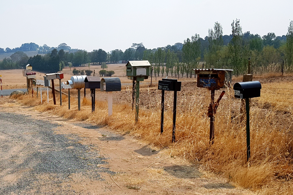 A row of mailboxes on a country road