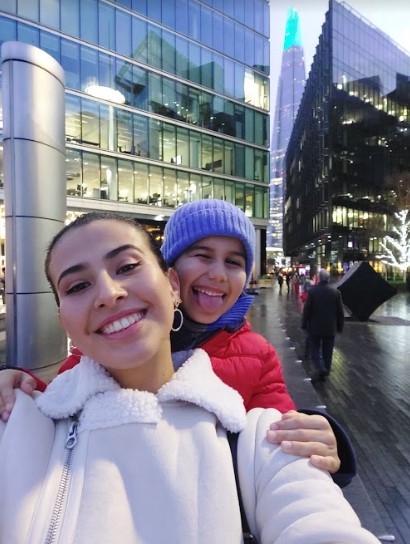 brother and sister posing in London Bridge near The Shard