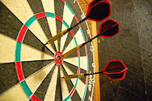 Darts in a dartboard - steeldarts