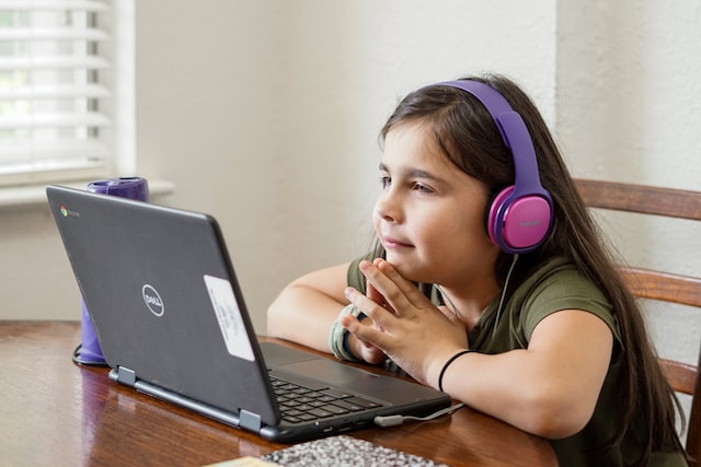 Photo of student sitting at desk