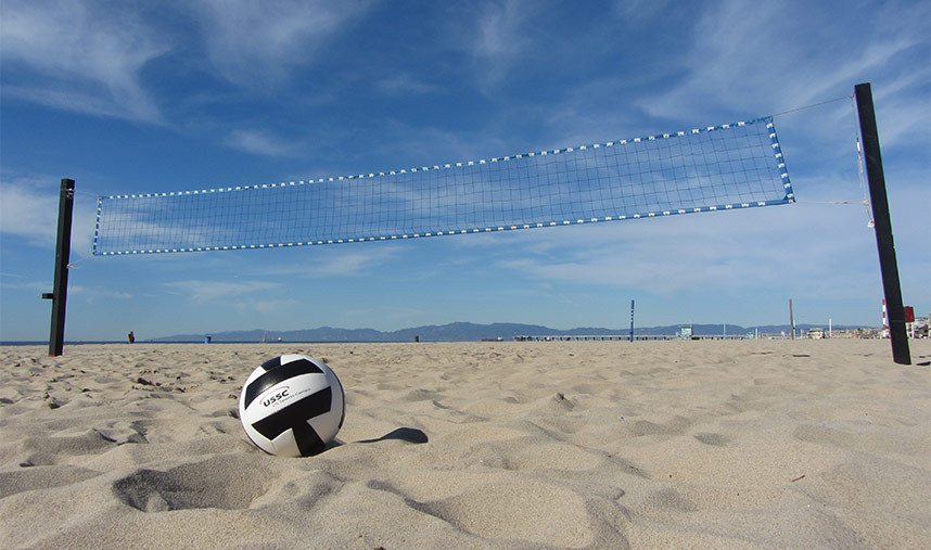 Volleyball court and ball at the beach