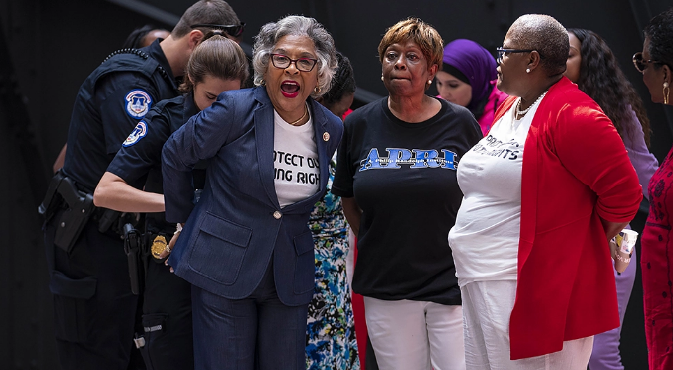 three friendly and peaceful looking black women getting arrested by US police
