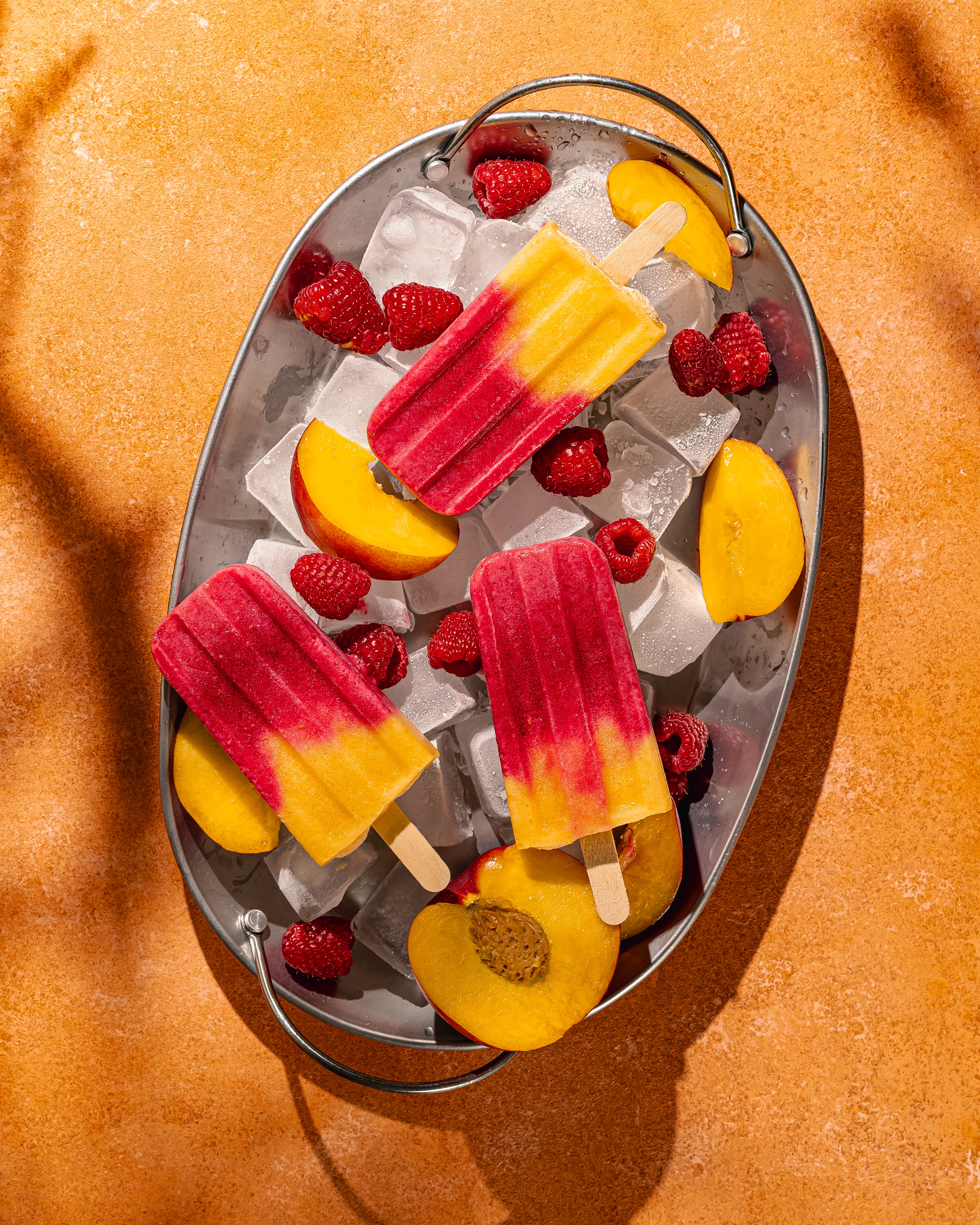 Peach raspberry popsicles