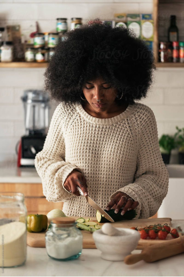 woman cutting vegetables