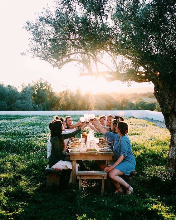 People gathered arouund a bonfire
