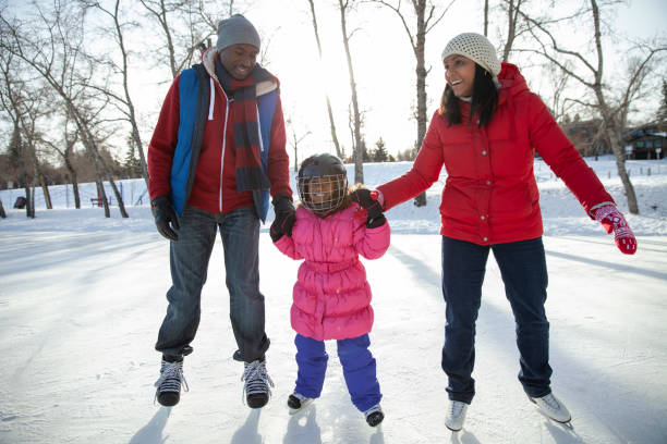 image of family skating