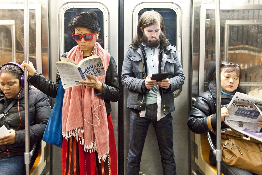Commuters reading