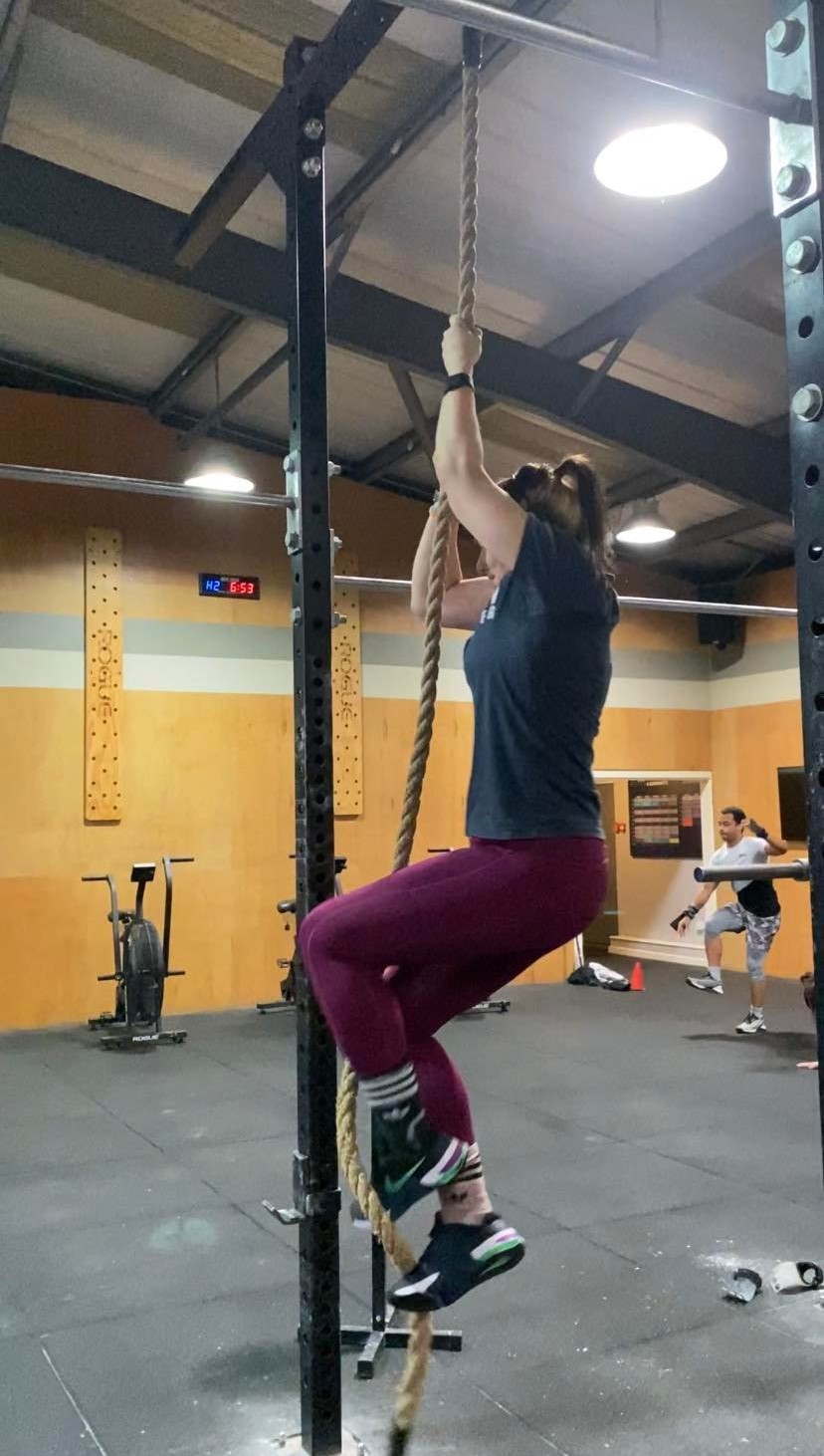 Kerry doing a rope climb