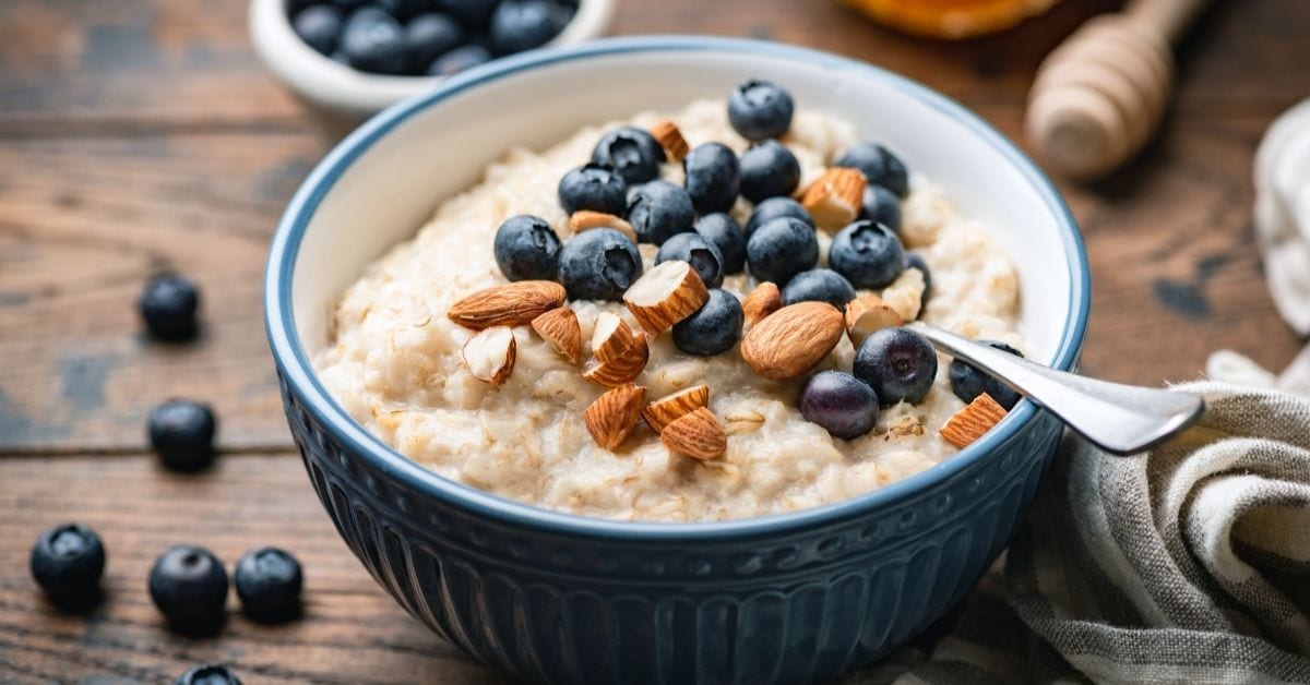 Bowl of oatmeal porridge with blueberries