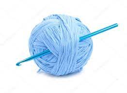 a ball of yarn with a crochet hook