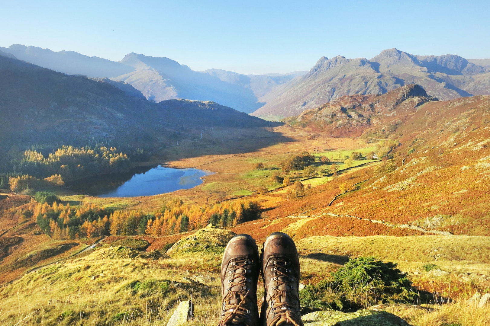 Hiking boots overlooking scenic mountains