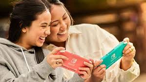 two girls playing nintendo switch