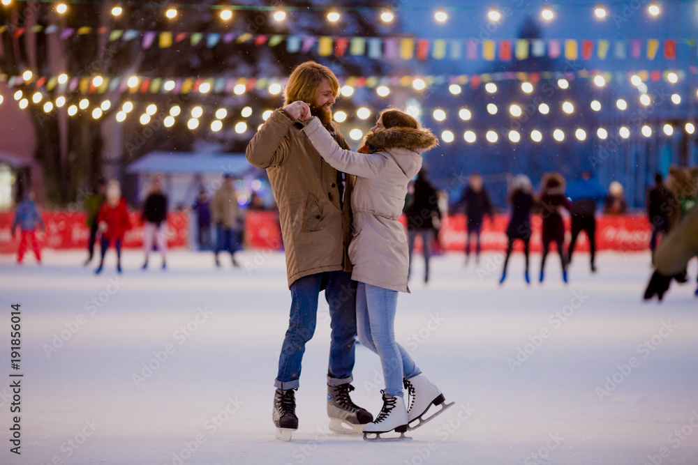 couple enjoying ice skating
