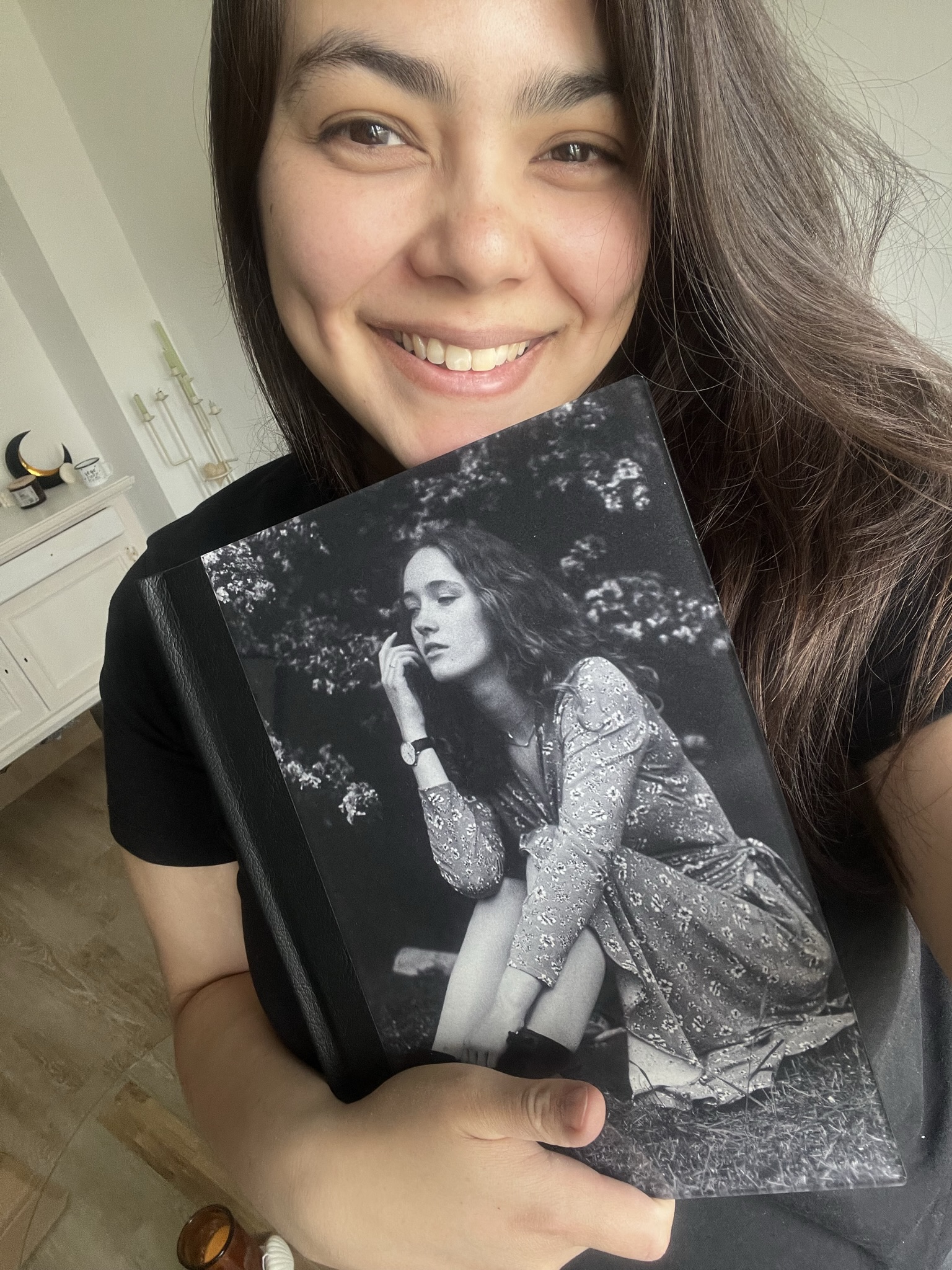 Image of Chantal Kemp with a Photobook
