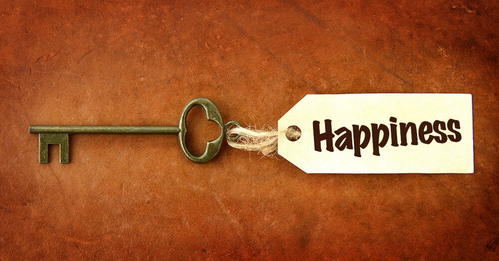 A symbolic picture of a key with a tag named happiness