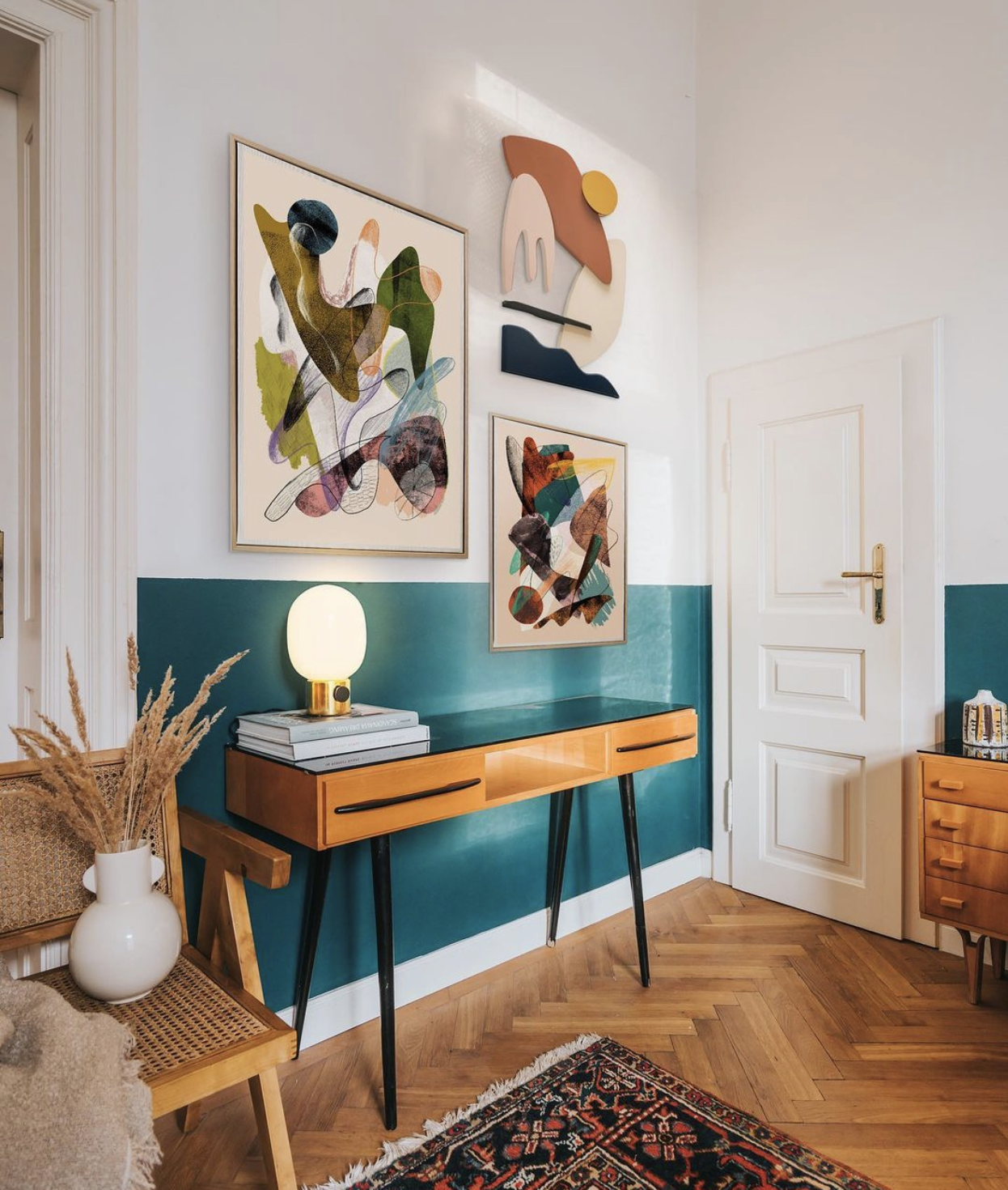 Entryway with blue wainscotting