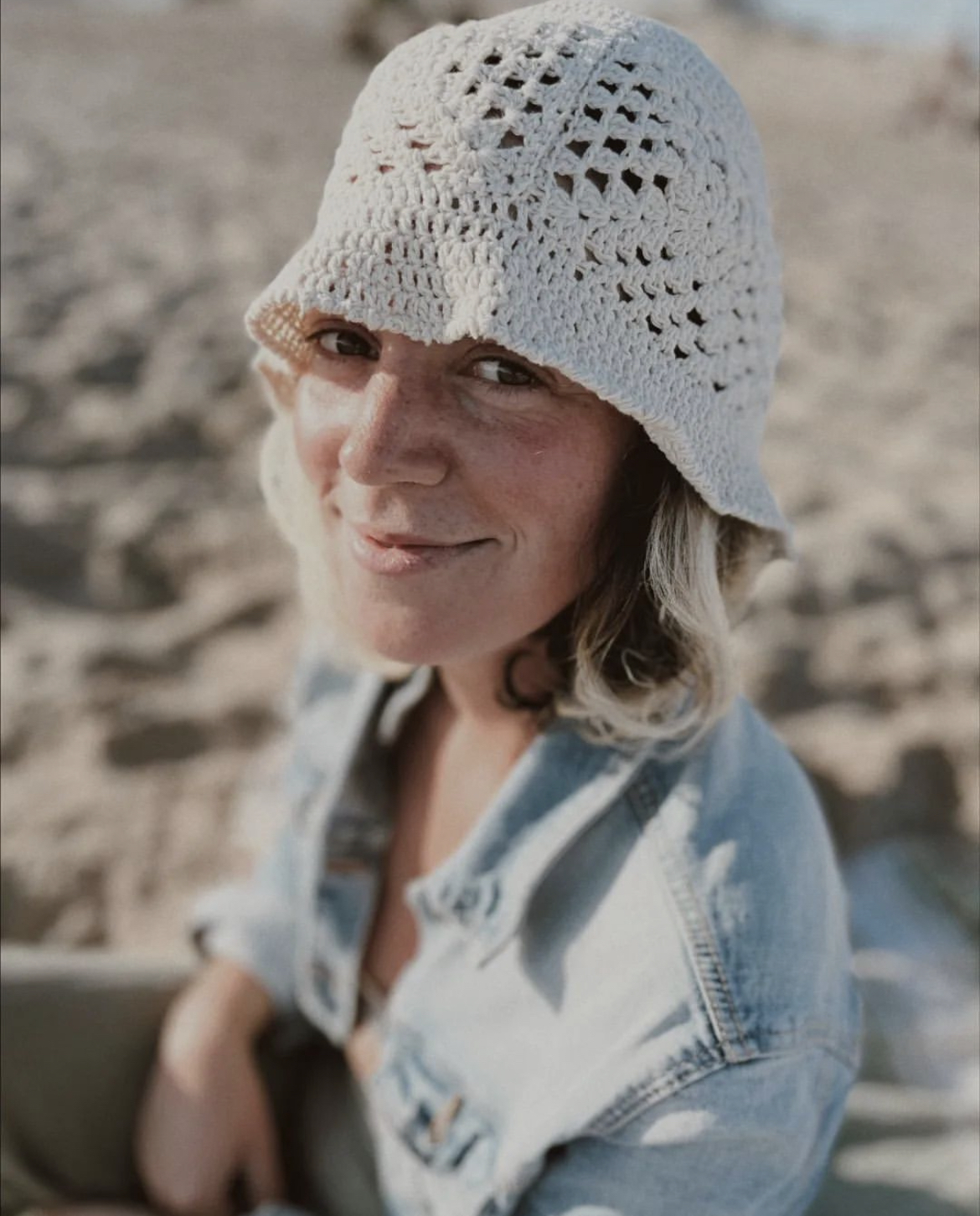 ale looking to the camara smiling 