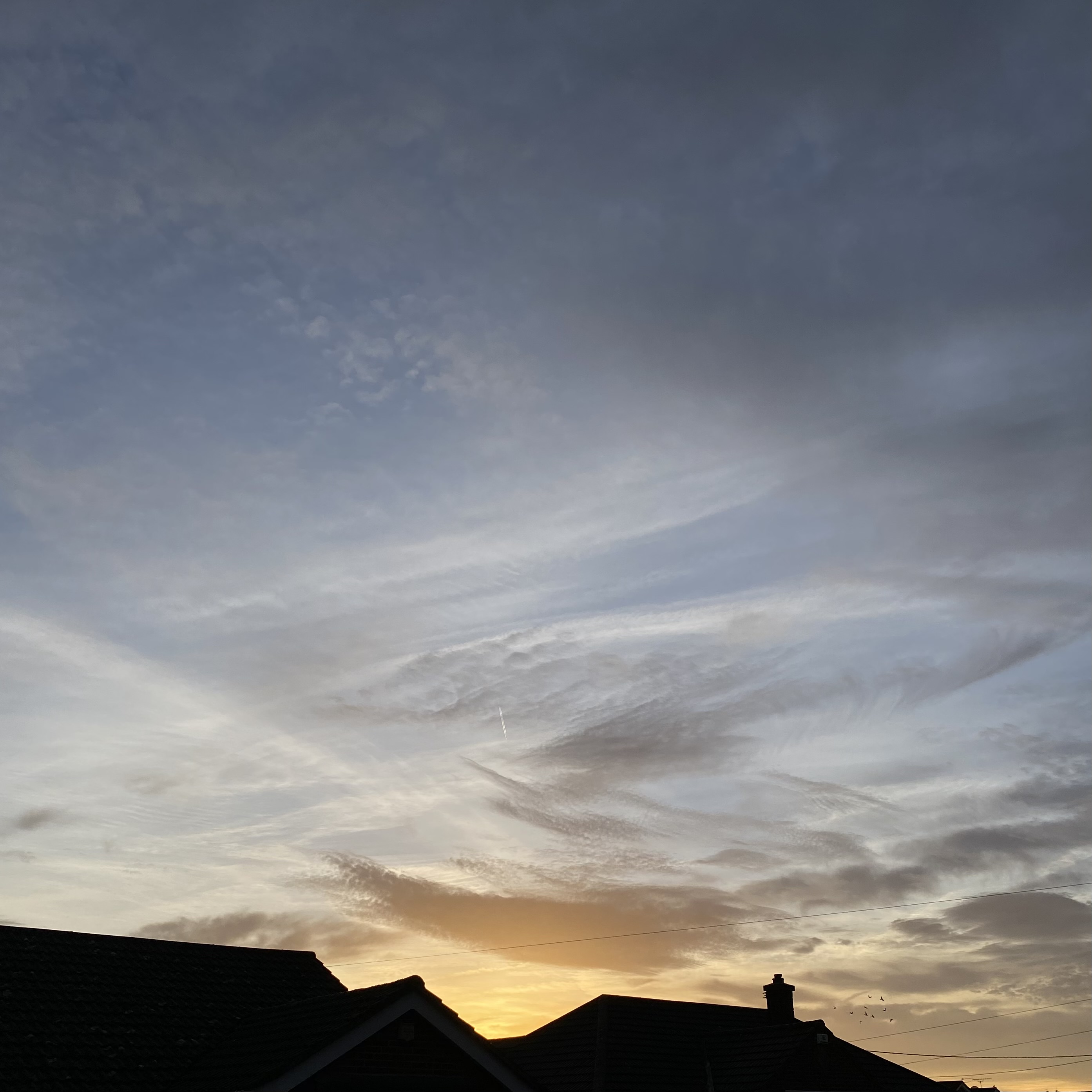 Wispy clouds at sunrise