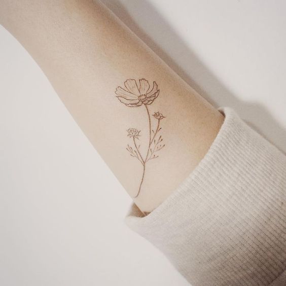 cosmos-forearm-tattoo
