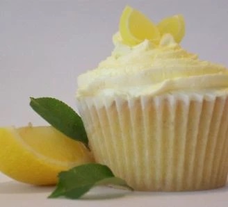 Lemon Cupcake with sliced fruit and herbs