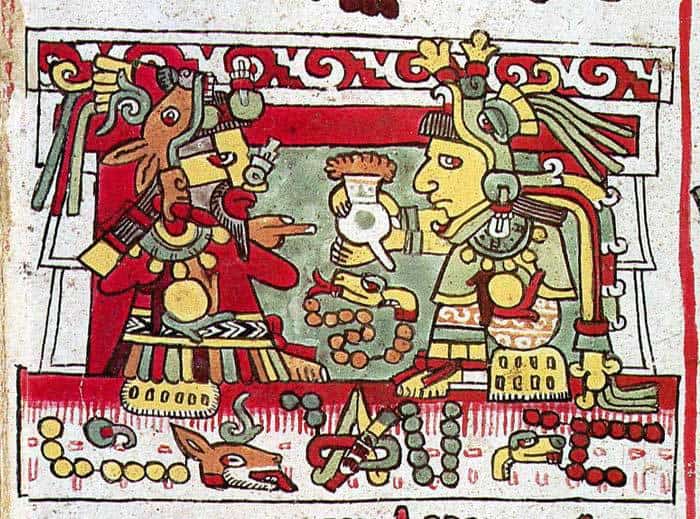 Ornate image in Mesoamerican art style featuring a king
      wearing a deer headdress receving a chocolate drink from his bride,
      Princess 13 Serpent, as part of a bridal ritual.