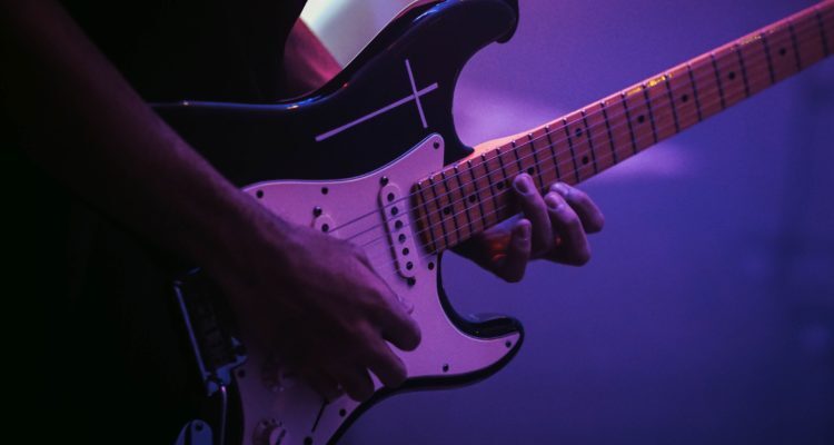 Electric guitar being played