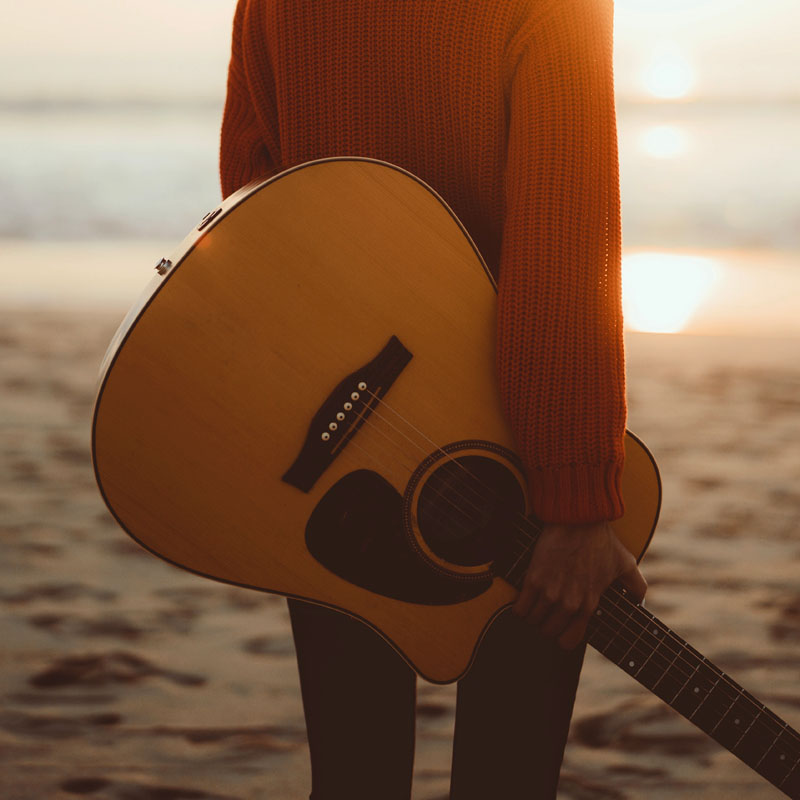 acoustic guitar at the beach